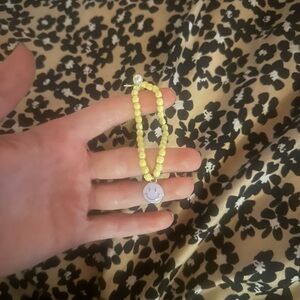 Yellow Beaded Bracelet with Smiley Charm